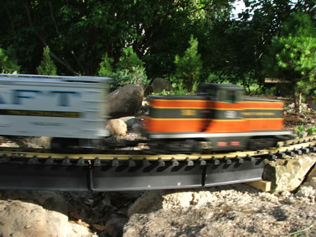 GE 44 Tonner crosses Drummer Creek at a high rate of speed