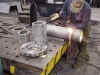 Ron Canfield Cutting Out Sections Of The Steel Pipe To Faci.JPG (55089 bytes)
