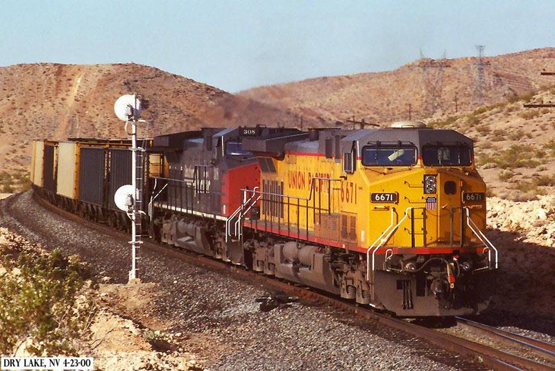 UP 6671 is only a 1/2 hr out of Vegas, these are the helper units on the rear of this empty coal train.