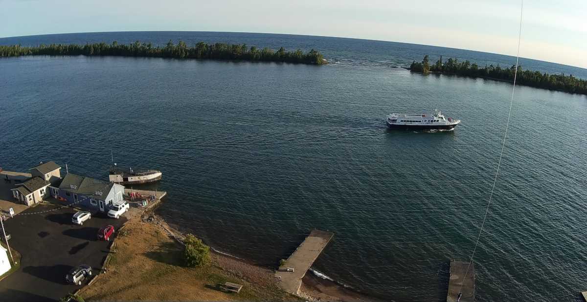 I am on the dock holding the kite string.