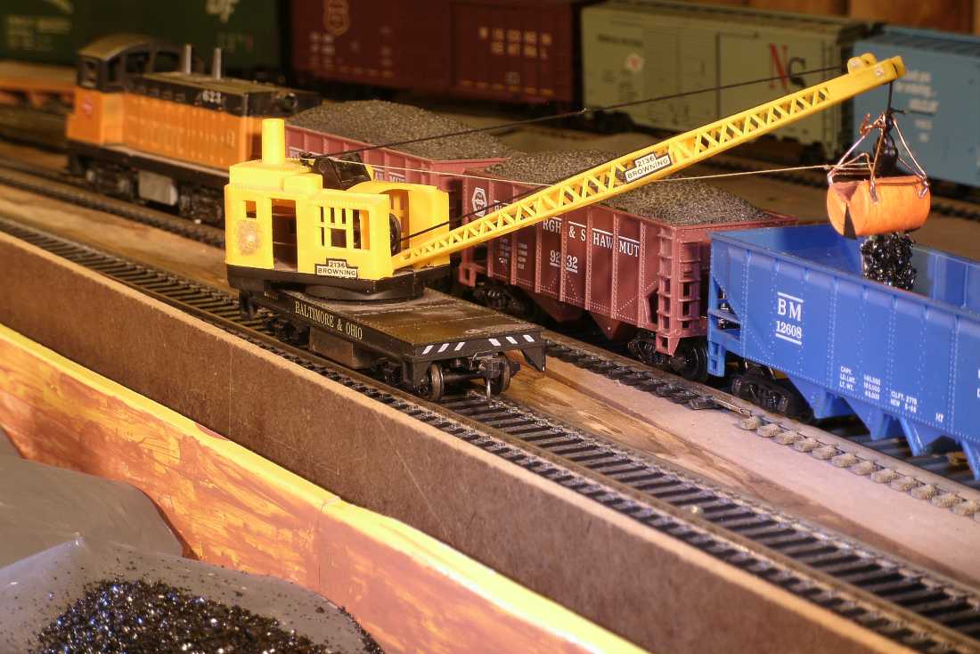 Rail Crane Unloading a Coal Barge on the Model Railroad