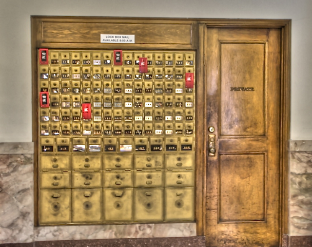 I wondered why there were red mailbox doors, then found the poster below.