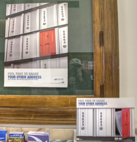 I wondered why there were red mailbox doors, then found the poster below.