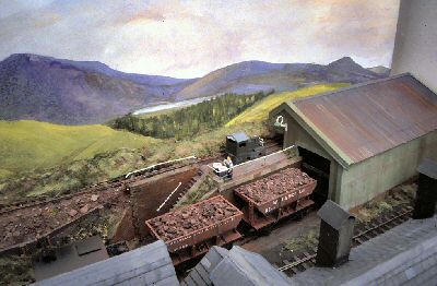 Iron ore being loaded into hopper wagons for transport to the ironworks on the Cumbrian coast