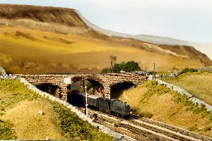 A Midland 4F approaches Ais Gill with the magnificent Wild Board Fell in the background