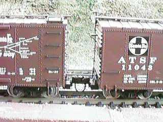 photo of usa boxcars mounted at an acceptable spacing