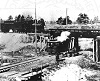 A H&D train passes under the brand new Toronto, Hamilton & Buffalo bridge over Aberdeen Ave late March of 1895