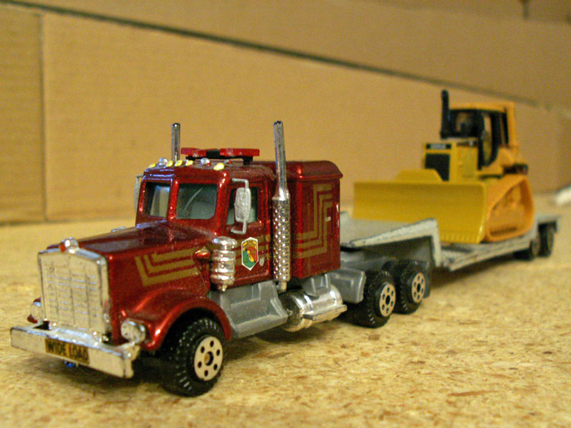 California Department of Forestry semi truck with lowboy trailer and bulldozer