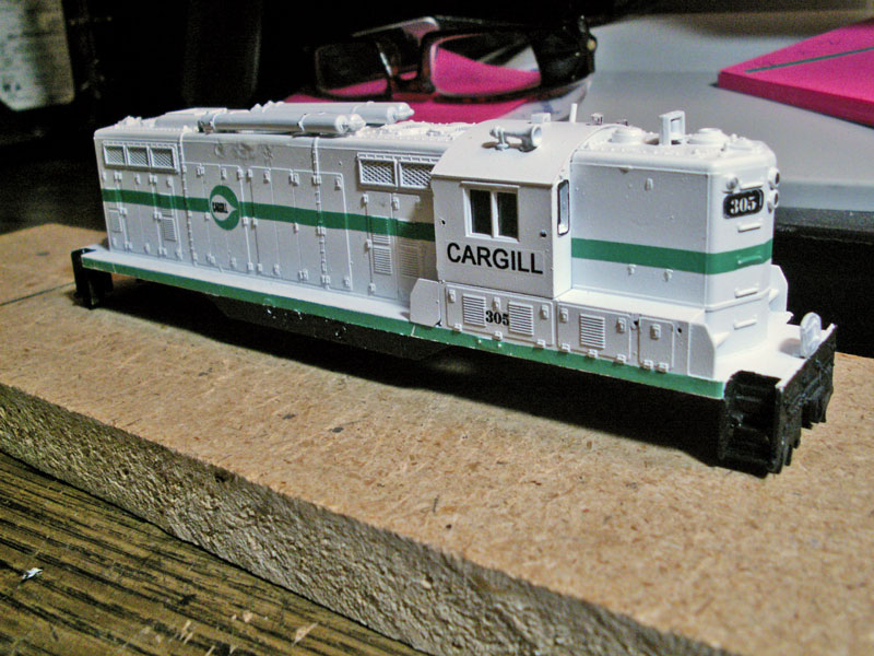 I designed custom decals and printed them on a laser printer.