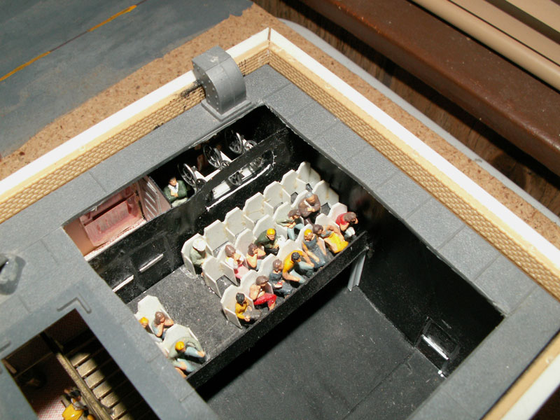 The projection room features handmade projectors and exhaust fan because