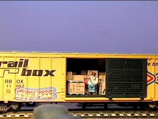railbox box car with hobo inside