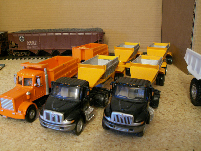 Boley semi's with bottom dump trailers, also Boley dump truck with dump trailer