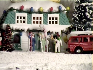 Skiers unload their SUV and check into the ski lodge during the Christmas 