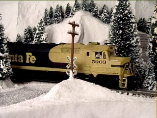 Leaving the town of Lone Wolf behind this Santa Fe freight enters the forest