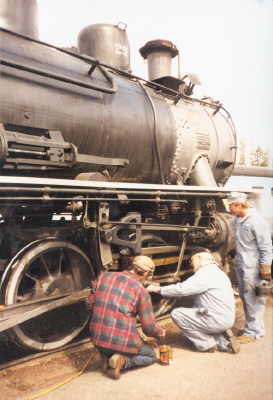 Malen, Michael and Zach grease the #25. Photo by Alicia Moore.