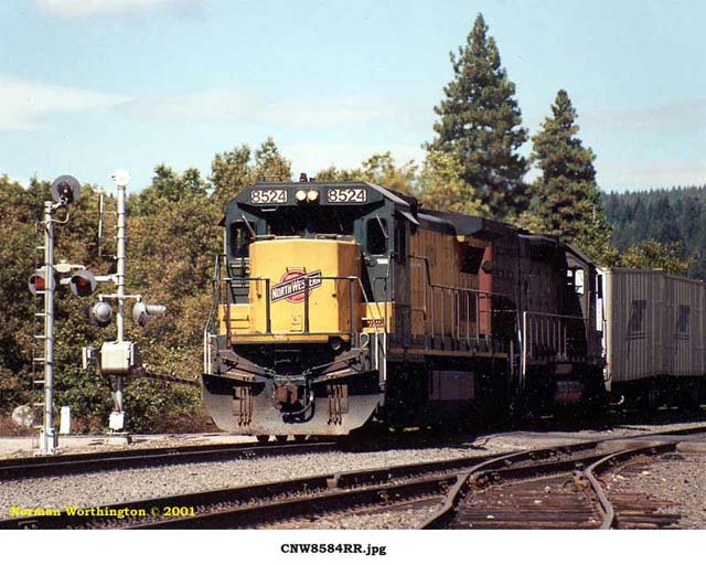  CNW8584 leads Swift train @ Mott,CA