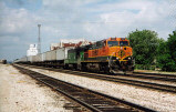 BNSF 1087 EAST PASSES THE EMPORIA DEPOT IN JUNE 1998