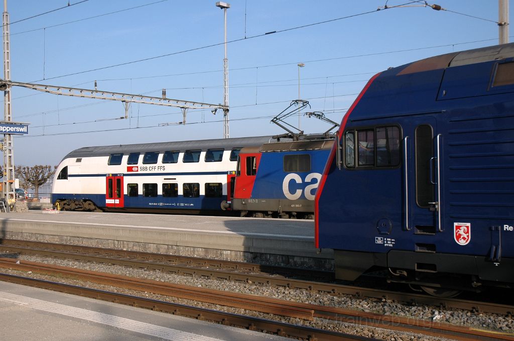 3050-0033-210314.jpg - SBB-CFF Re 450.010-4 "Steinmaur" + Re 421.380-7 + RABe 514.054-6 / Rapperswil 21.3.2014