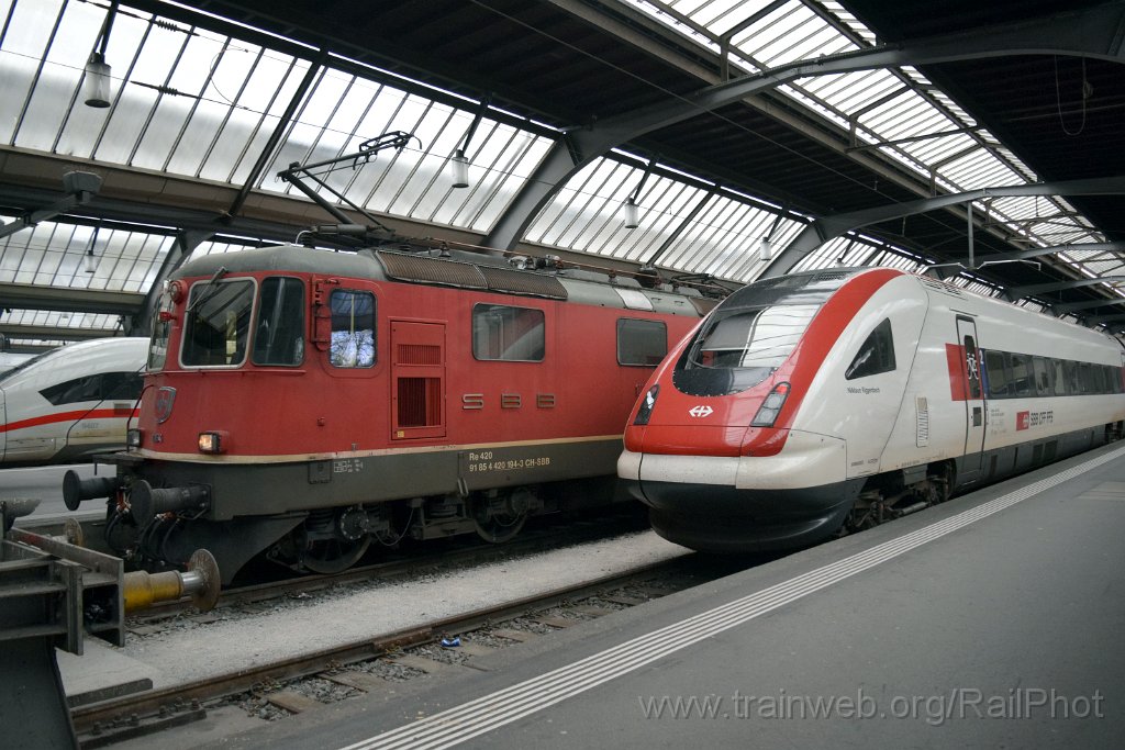 9018-0025-310324.jpg - SBB-CFF Re 4/4" 11194 + ICN RABe 500.035 "Nikolaus Riggenbach" / Zürich HB 31.3.2024