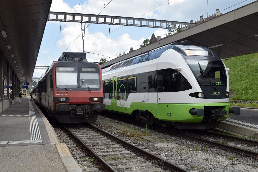 9838-0011-210625.jpg - TRN RABe 523.077 + SBB-CFF RBDe 560.234-7 / La Chaux-de-Fonds 21.6.2025