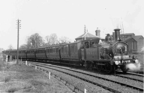 S&DJR train passing Wimborne Loop signal-box