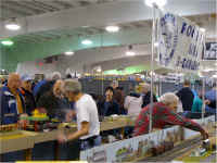 George Cole on the left is monitoring the accessory modules while Chuck Smith on the right operates the yard modules.