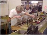 Duane Minor (right) constructed the bridge that is in the forground of this photo.  There is another bridge like it that is painted silver.