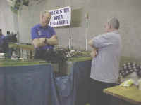 Ted Larson and Duane Miner are next to one of the two foot modules on the layout.