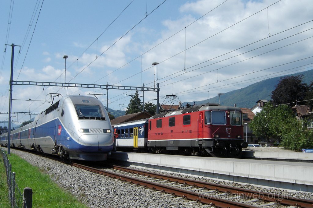 1211-0032-230806.jpg - SNCF TGV 384.001 / 4401 + SBB-CFF Re 4/4'' 11144 / Grenchen-Süd 23.8.2006