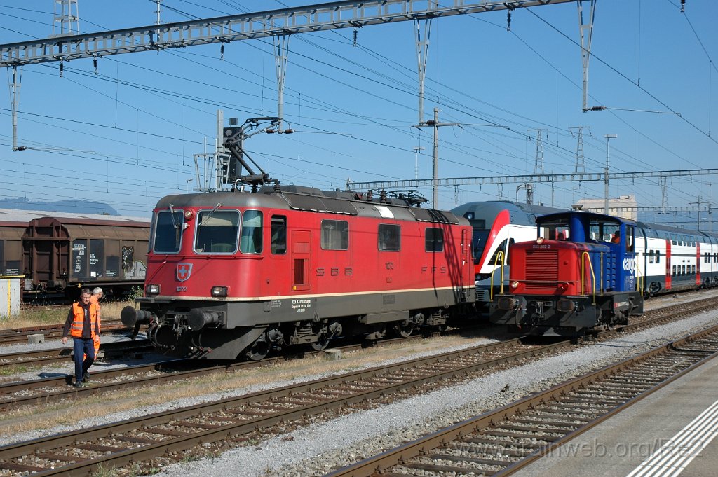 2611-0039-140912.jpg - SBB-CFF Re 4/4'' 11272 ''100. Klimaanlage eingebaut im IW Biel'' + SBBC Tm 232.202-2 / St.Margrethen 14.9.2012