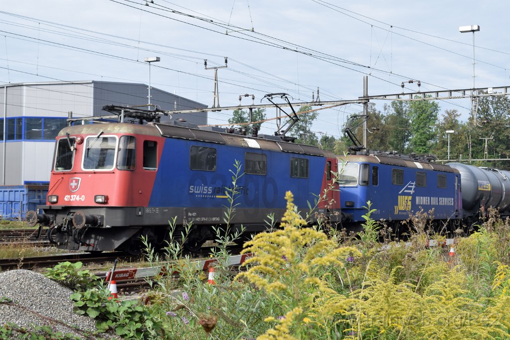 8762-0040-160923.jpg - SRT Re 421.374-0 (Re 91 85 4 421 374-0 CH-SRTAG) + WRS Re 421.373 (Re 91 85 4 421 373-2 CH-WRSCH) / Glattbrugg 16.9.2023
