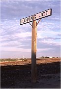 station sign, Loving Jct., NM
