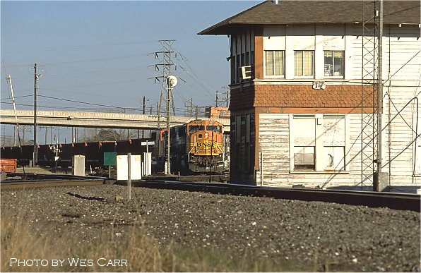 A BNSF empty coal train approaches Tower 17. 