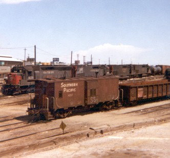 One of my early train photos:  Westbound and 
eastbound SP 
trains meet in El Paso - 1984