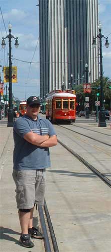 Nathan, the Webmaster, posing in front of the streetcar and the local area where he took a photo that was in Railfan & Railroad's May 2005 issue. (page 38)