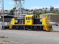 DSJ 4017 with flat-deck wagon on test run in Ahuriri Yard