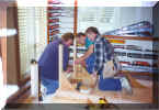 Phil Williams, Gary Trapp, and Bill Weed attach gussets.