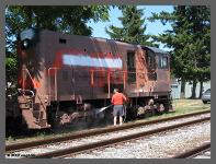 (c)2012 smph50 - Rick Burns takes his turn washing the truck frames. (10K) - CLICK to Enlarge (100K)