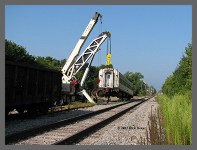 (c)2013 Rick Henn - Lowering replacement set into place. (10K) - CLICK to Enlarge (100K)