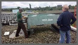 (c)2014 JKocsis - Al O. and Rick H. work on disassemby of old AC Condensing Unit on the roof of the HDC. (10K) - CLICK to Enlarge (150K)