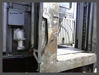 (c)2008 Rick Henn - another view of the ripped up buffer plate on Coach #2918. Quite a bit of force needed to tear the stainless steel like this! (10K) - CLICK to Enlarge (100K)
