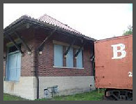 (c)2008 Robert Snyder - New plywood and paint now cover the trio of windows on the freight station thanks to the hard work of Depot Chairman, Bob S. (10K)
