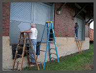 (c)2008 Robert Snyder - Bob R. and Jim S. continue the painting and priming the freight station doors. (10K) - CLICK to Enlarge (100K)