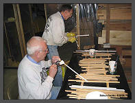 (c)2008 Robert Snyder - Bob and Gary paint an endless supply of window parts for the new coupola on the BR&P Caboose. (10K) - CLICK to Enlarge (100K)