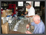 (c)2008 Robert Snyder - Roger and Bob R. work on the depot canopy fixtures. (10K) - CLICK to Enlarge (100K)