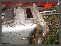 Cutting out the rusted metal and removing the old rivets. (c)2006 smph50 (10K) - CLICK to Enlarge (90K)