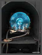 Close up of the green lens, socket and 18 watt precision bulb. The bulb filament is located directly behind the center of the lens. (c)2008 smph50 (10K) - CLICK to Enlarge (90K)