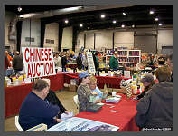 Don and Winnie B. man the Chinese Auction Table with lots of great chances to win!. &copy;2009 Robert Snyder - Click to Enlarge (10K)-(70K)