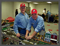 The boys at the Western New York Garden Railway Society do some track repair. &copy;2009 Robert Snyder - Click to Enlarge (10K)-(70K)