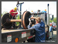 (c)2006 Robert 
Snyder - Wheel Set being removed from Winter's Riggin flatbed truck. (10K) - CLICK to Enlarge (70K)
